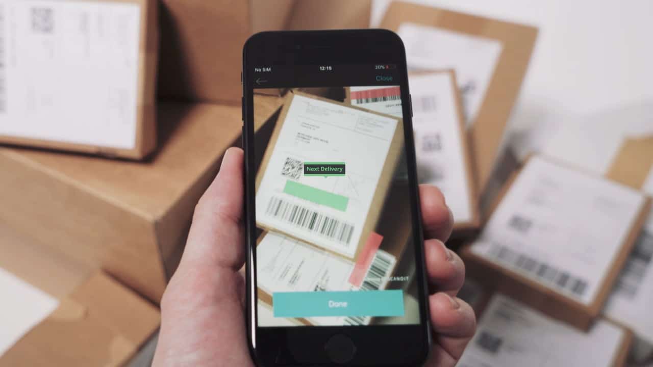 scanning barcodes on packages to find next delivery